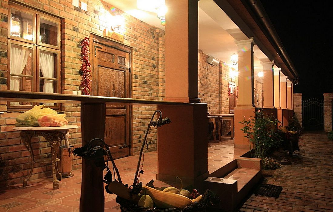 Sitting on the terrace by night, Didin Konak, Baranja